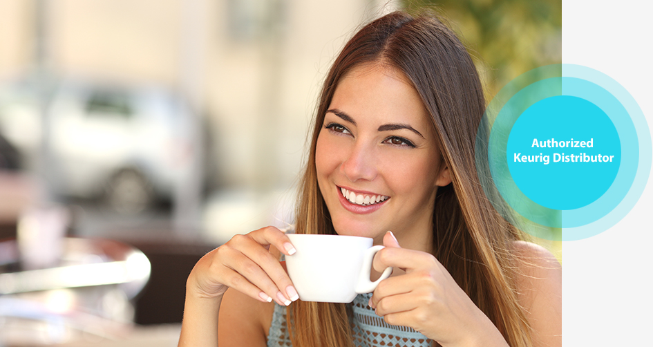 Woman drinking a cup of hot coffee at work